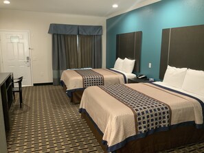 Premium bedding, pillow-top beds, iron/ironing board, free WiFi - Regency Inn and Suites (Houston)