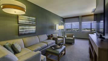 Desk, laptop workspace, blackout drapes, iron/ironing board