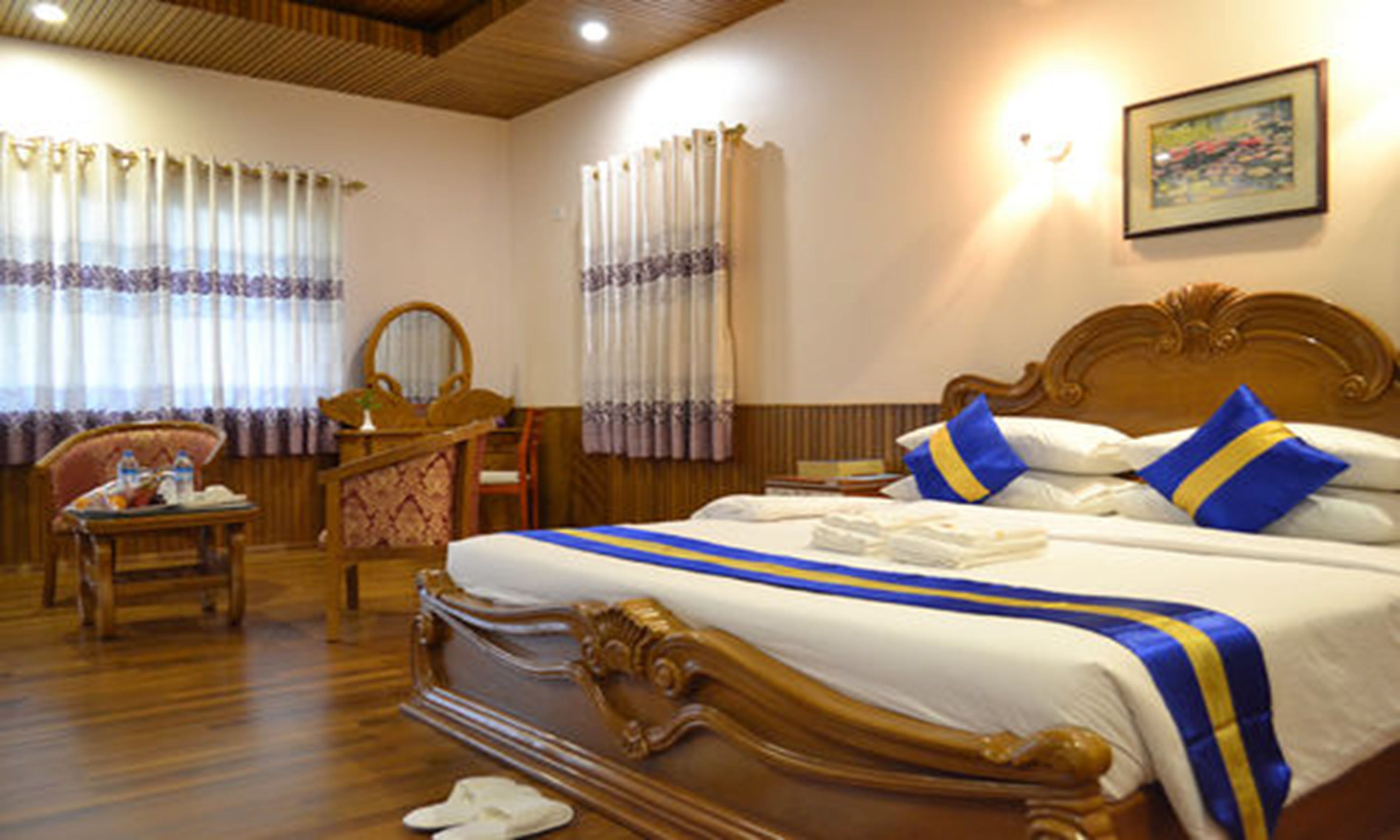 Garden Suite | Minibar, in-room safe, desk, iron/ironing board