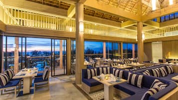 Dinner served, international cuisine, pool views