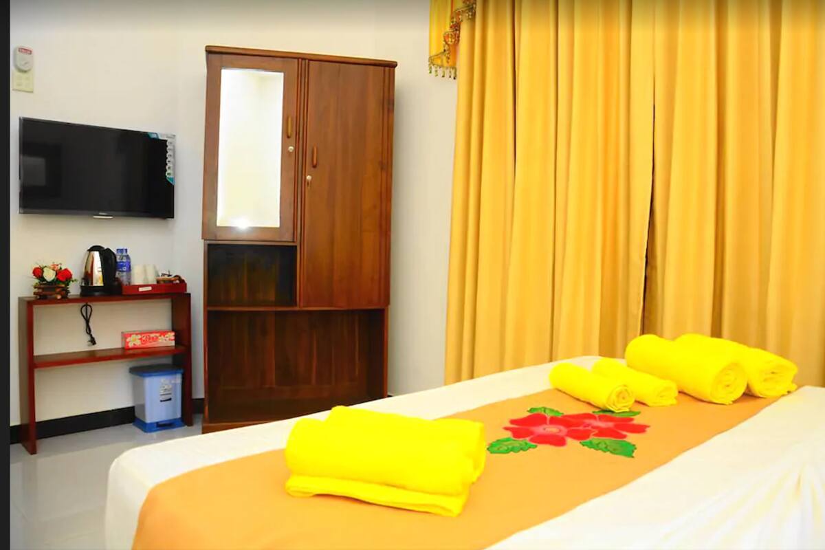 Chambre Deluxe, 1 très grand lit | Rideaux d’obscurcissement, accès au Wi-Fi (inclus)