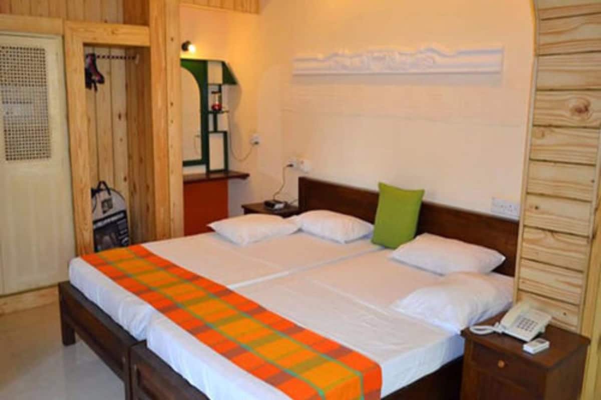 family room (with fan only) | desk, free wifi, bed sheets