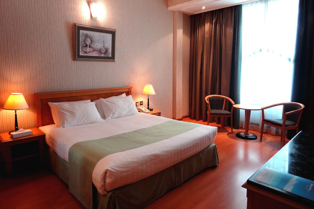 Camera Deluxe | Biancheria da letto di alta qualità, minibar, una cassaforte in camera