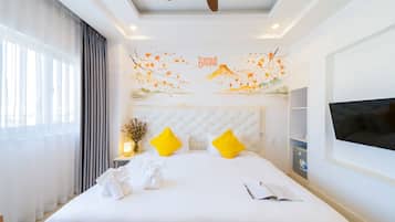 Phòng đôi Deluxe | Bộ đồ giường cao cấp, nệm có lớp đệm bông, minibar