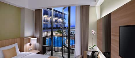 Superior Room with Pool View | In-room safe, desk, free WiFi, bed sheets