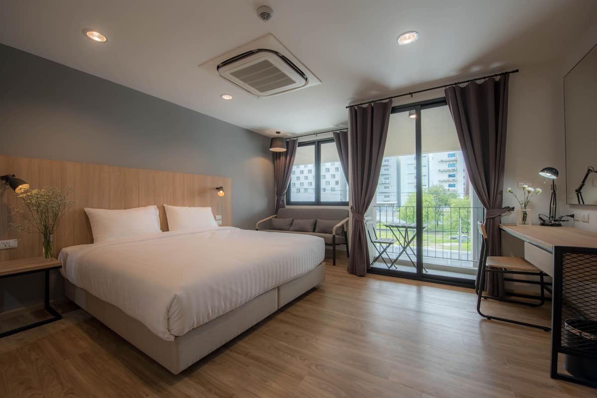 Balcony Room (Building A) | In-room safe, laptop workspace, blackout drapes, WiFi