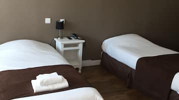 Habitación triple Confort | Ropa de cama de alta calidad, cunas gratuitas y wifi gratis