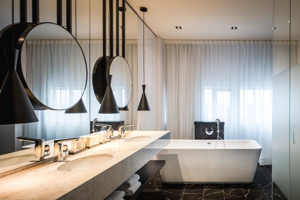 junior suite | bathroom | shower, rainfall showerhead, free toiletries, hair dryer