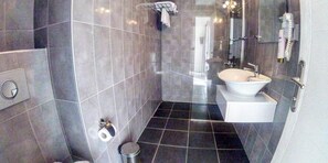 Shower, free toiletries, hair dryer, slippers