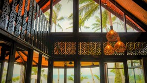 Deluxe Villa, 2 Bedrooms, Patio, Beachfront | Living room - The Natives Samui (Koh Samui)