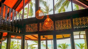Deluxe Villa, 2 Bedrooms, Patio, Beachfront | Living room - The Natives Samui (Koh Samui)