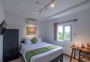 Standard Double Room | Minibar, in-room safe, desk, iron/ironing board - Purple Hue Charming Riverside Hotel (Hue)