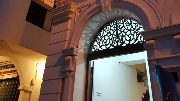 A boutique hotel entrance with a sign for 'Star Anise Boutique Capsules' and a reception area visible inside. - Star Anise Boutique Capsule (Colombo)