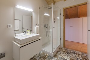 Superior Loft, Balcony, Garden View | Bathroom | Shower, rainfall showerhead, free toiletries, hair dryer