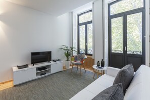 Premium Apartment, Balcony, City View | Living area | 33-inch flat-screen TV with satellite channels, TV, DVD player