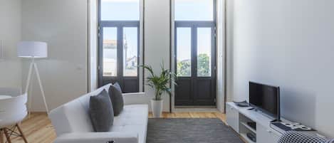 Appartement Deluxe, 1 chambre, terrasse, vue jardin | Salle de séjour