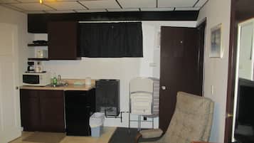 Fridge, microwave, coffee/tea maker, cookware/dishes/utensils
