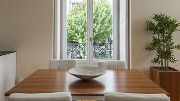 Deluxe Apartment, City View | Living room | 36-inch flat-screen TV with cable channels, TV, DVD player
