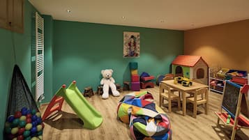 Children can play and explore in this vibrant playroom featuring a slide, soft play area, and table with chairs.
