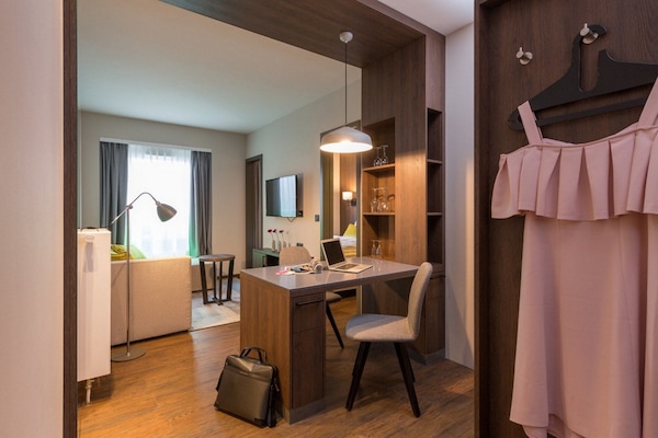 Studio with king bed | Living area | Flat-screen TV