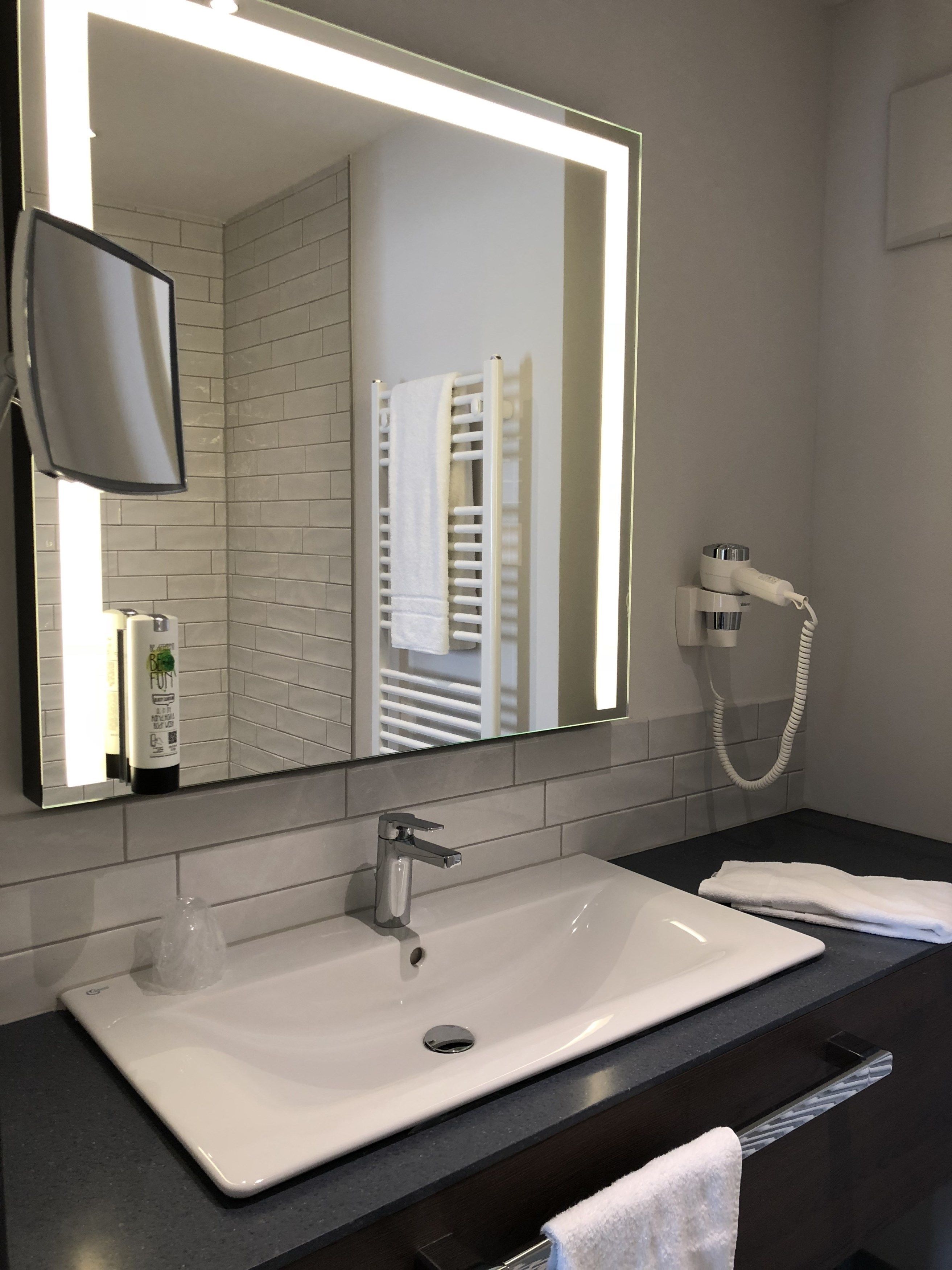 studio with king bed | bathroom | shower, free toiletries, towels