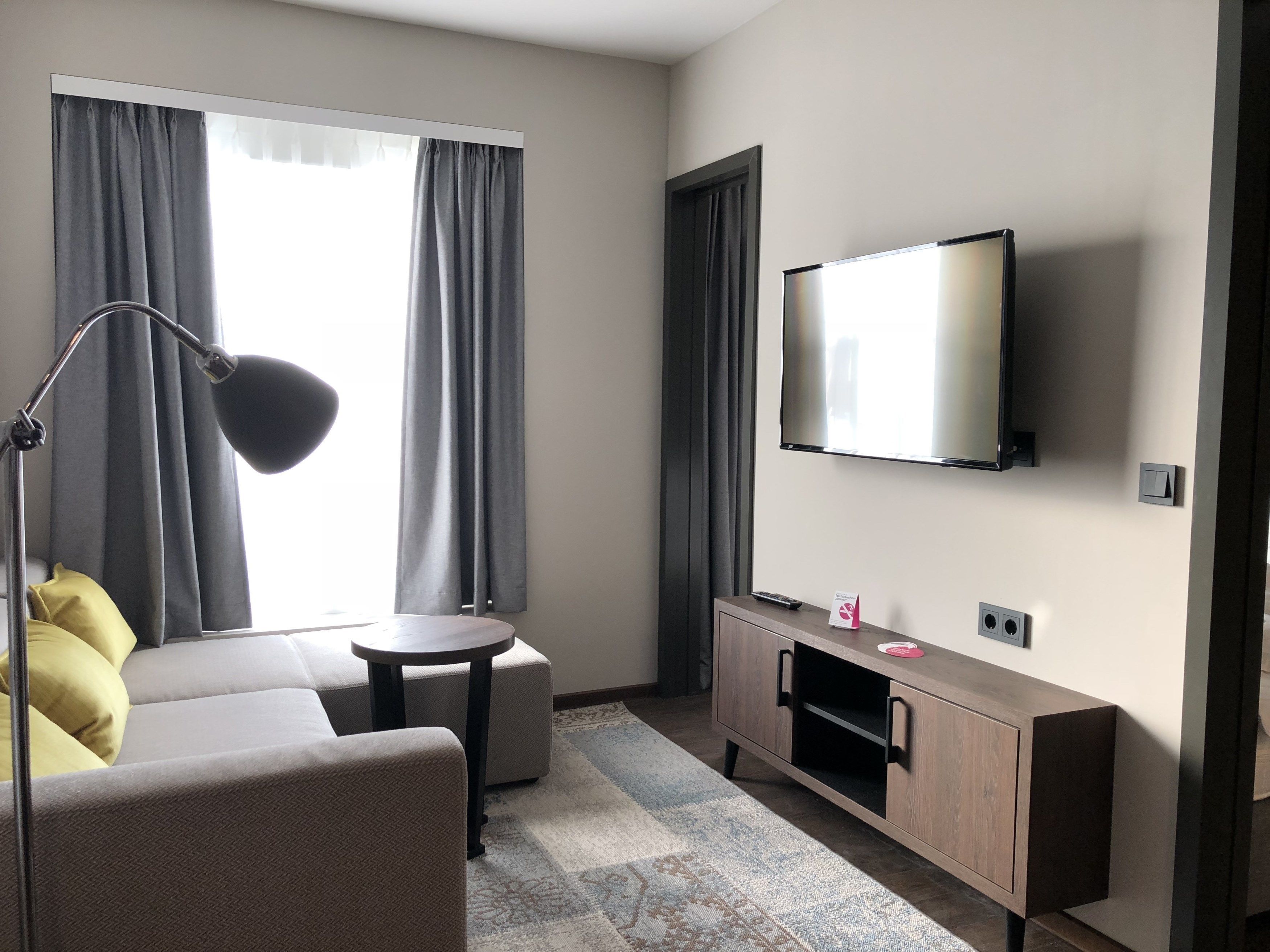 studio with king bed | living room | flat-screen tv