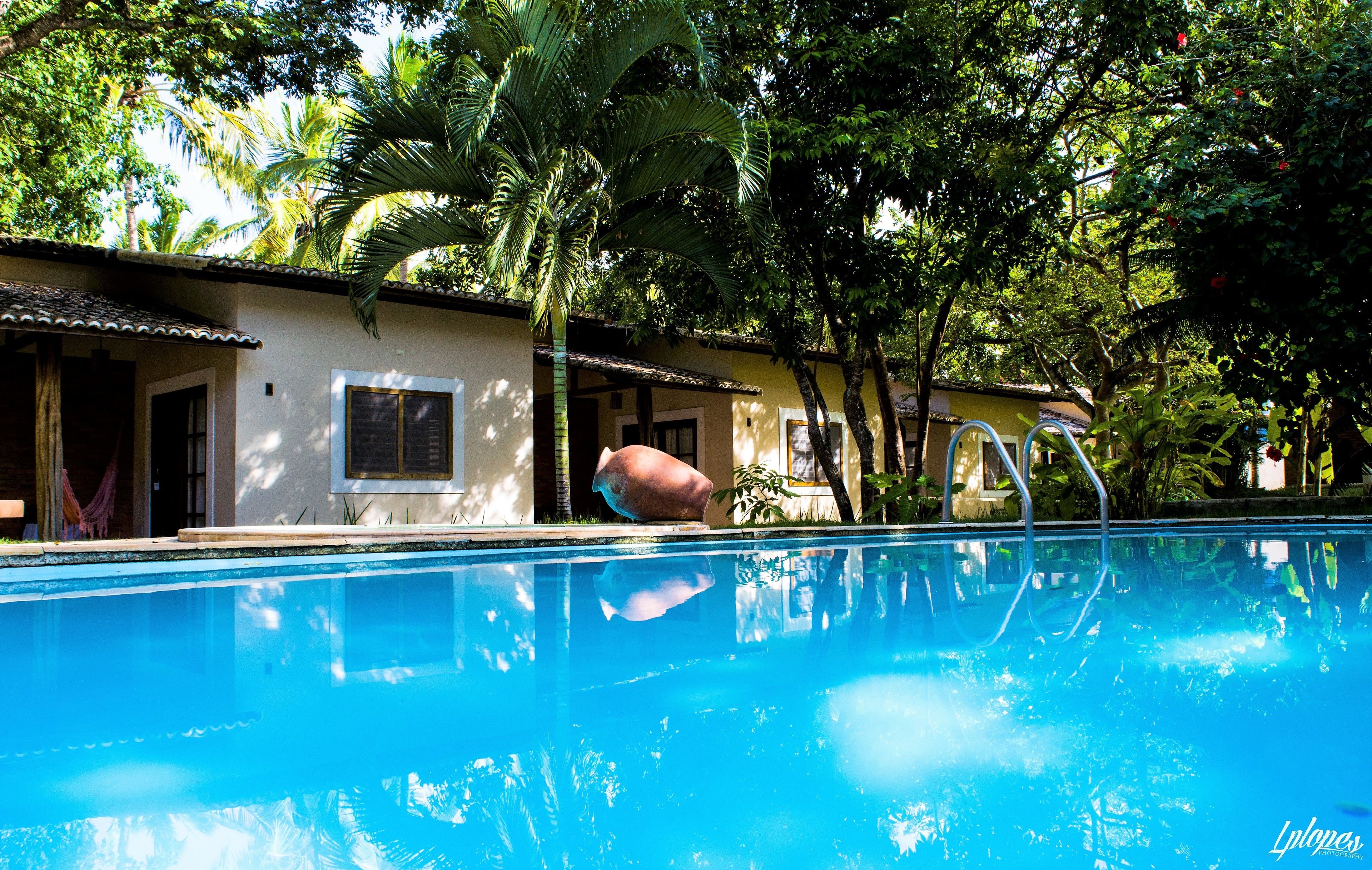 2 outdoor pools, open 7:00 AM to 9:30 PM, pool umbrellas, sun loungers