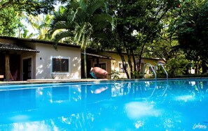 2 outdoor pools, open 7:00 AM to 9:30 PM, pool umbrellas, pool loungers