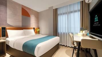 Desk, blackout curtains, free WiFi, bed sheets