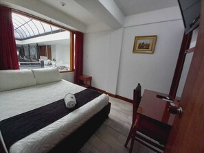 Executive Double Room, 1 Double Bed, Private Bathroom, Courtyard View | Minibar, individually decorated, individually furnished, desk