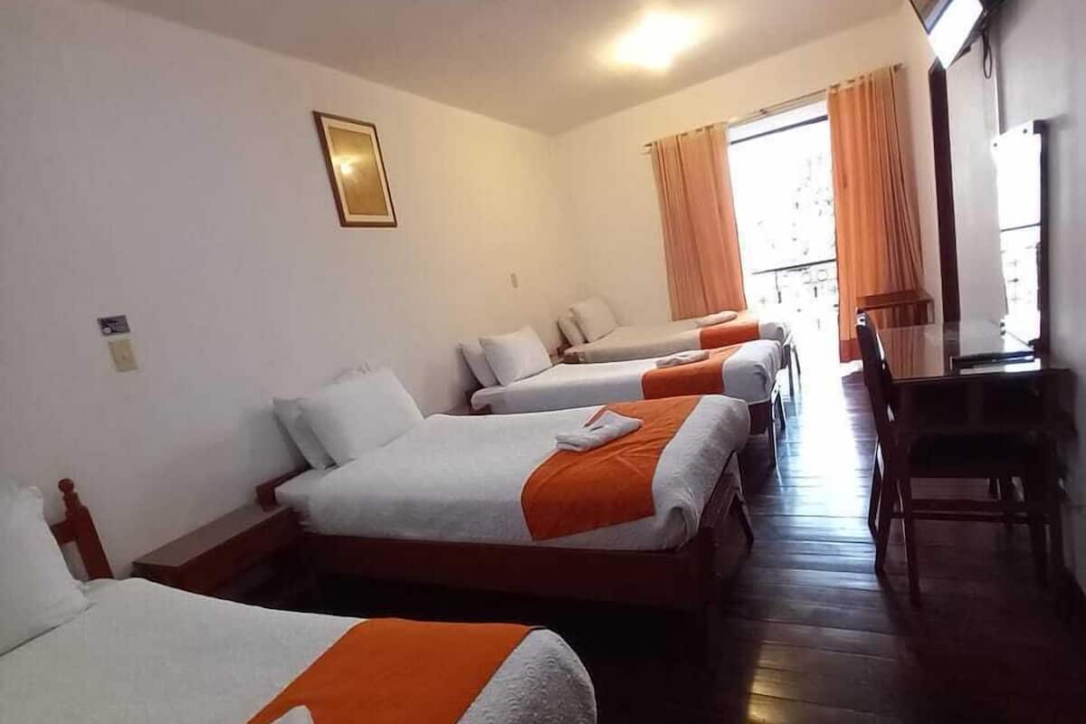 Family Quadruple Room, Multiple Beds, Balcony, City View | Minibar, desk, blackout curtains, free WiFi