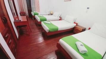 Family Quadruple Room, Multiple Beds, Balcony, City View | Minibar, individually decorated, individually furnished, desk