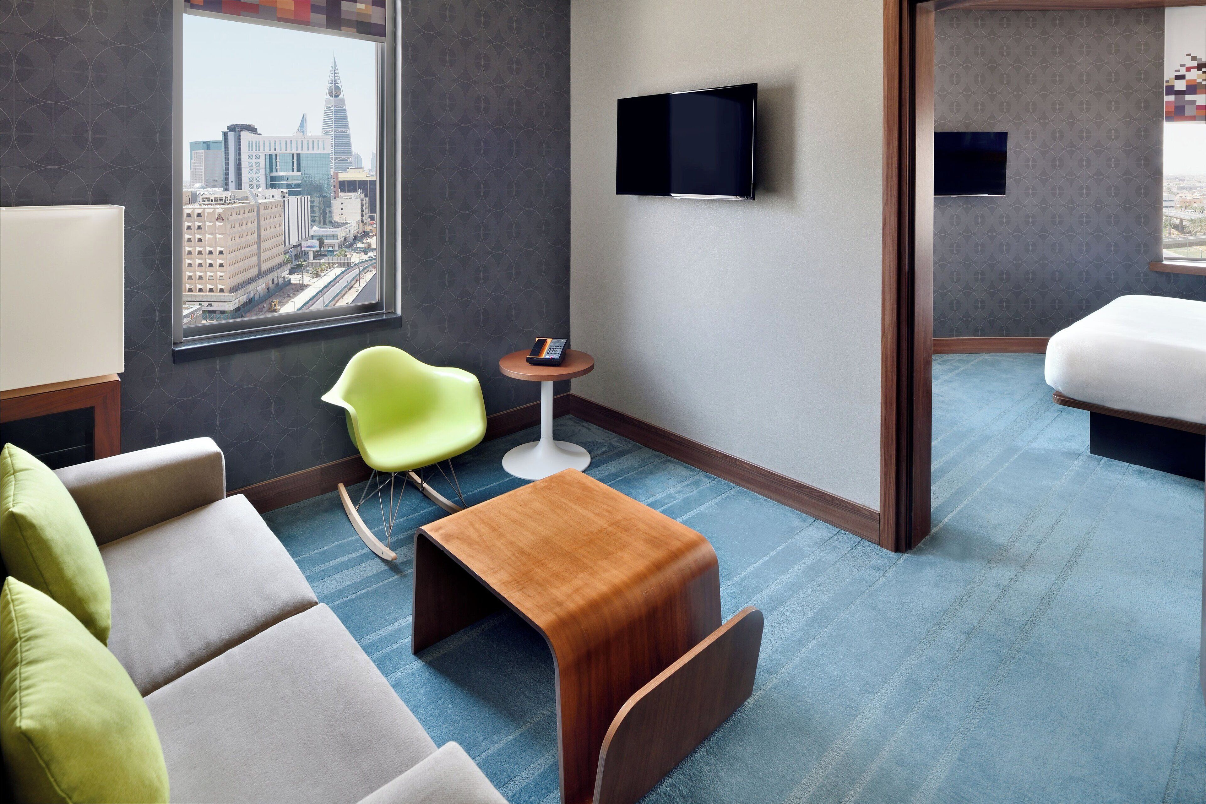 suite, 1 king bed, city view | living room | lcd tv