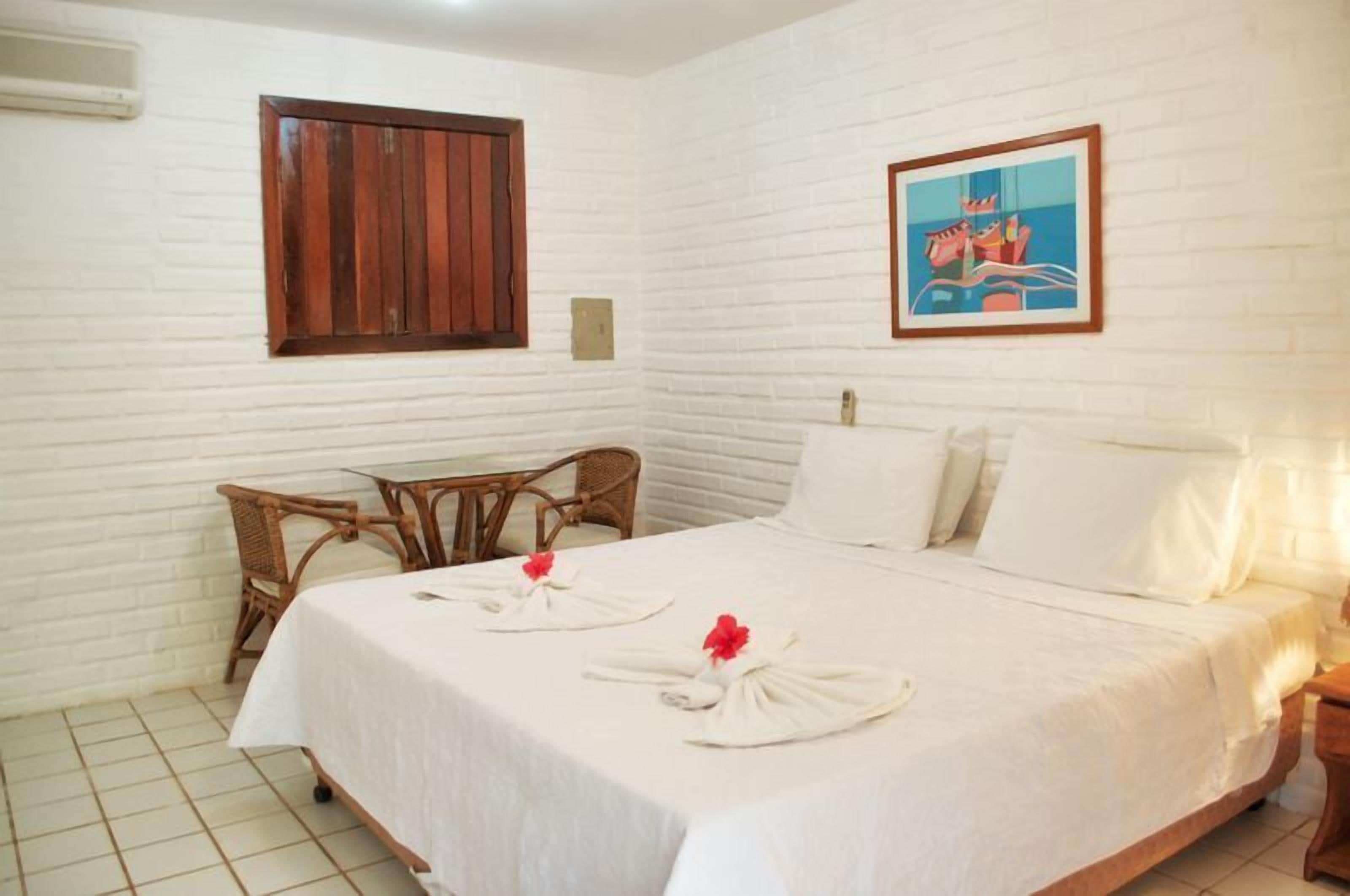 Frigobar, cortinas blackout, Wi-Fi de cortesia, roupa de cama