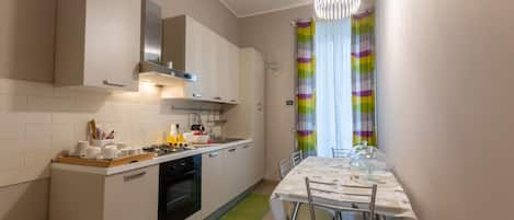 Double or Twin Room | Shared kitchen | Full-sized fridge, microwave, espresso maker, coffee/tea maker