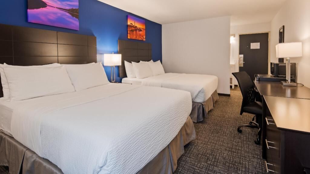 Pillow-top beds, desk, laptop workspace, iron/ironing board