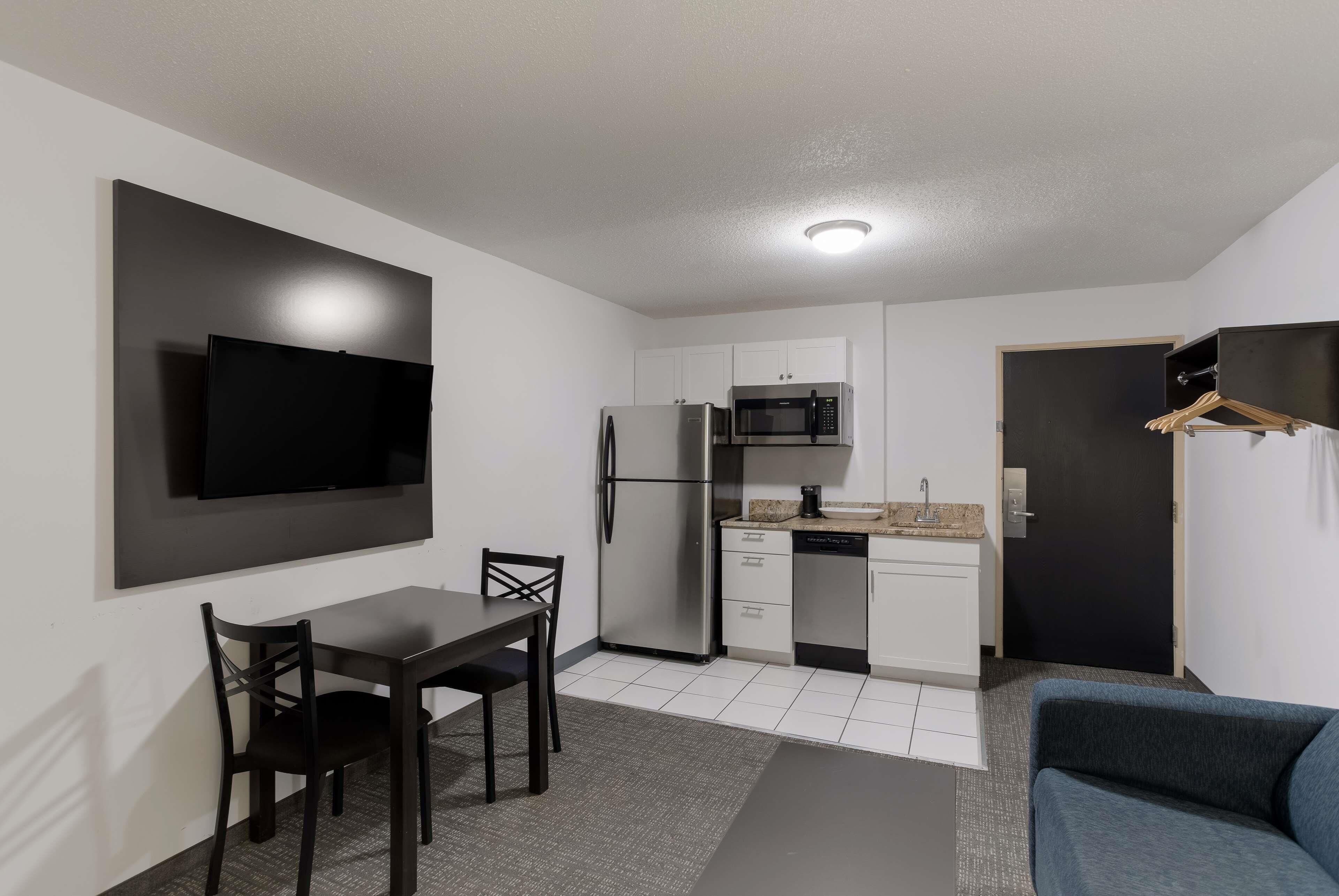 pillow-top beds, desk, laptop workspace, iron/ironing board