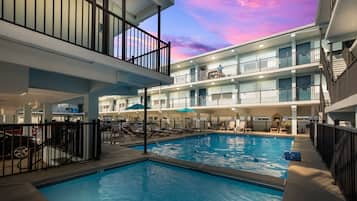 Outdoor pool, open 9 AM to 8:00 PM, pool umbrellas, pool loungers