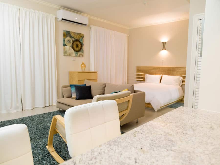 Apartamento superior, 1 quarto, suíte | 1 quarto, roupas de cama de algodão egípcio, cofres nos quartos