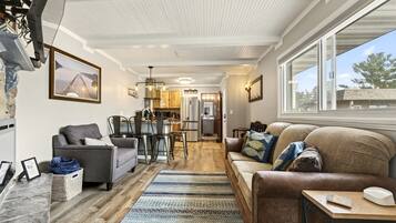 Suite, 2 Bedrooms, Kitchen, Lake View | Living area | 32-inch flat-screen TV with cable channels, TV