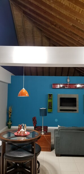 Executive Apartment, 1 Bedroom, Kitchen, Corner | Living room | 50-inch flat-screen TV with cable channels, TV, DVD player - New Kingston Guest Apartment at Donhead (Kingston)
