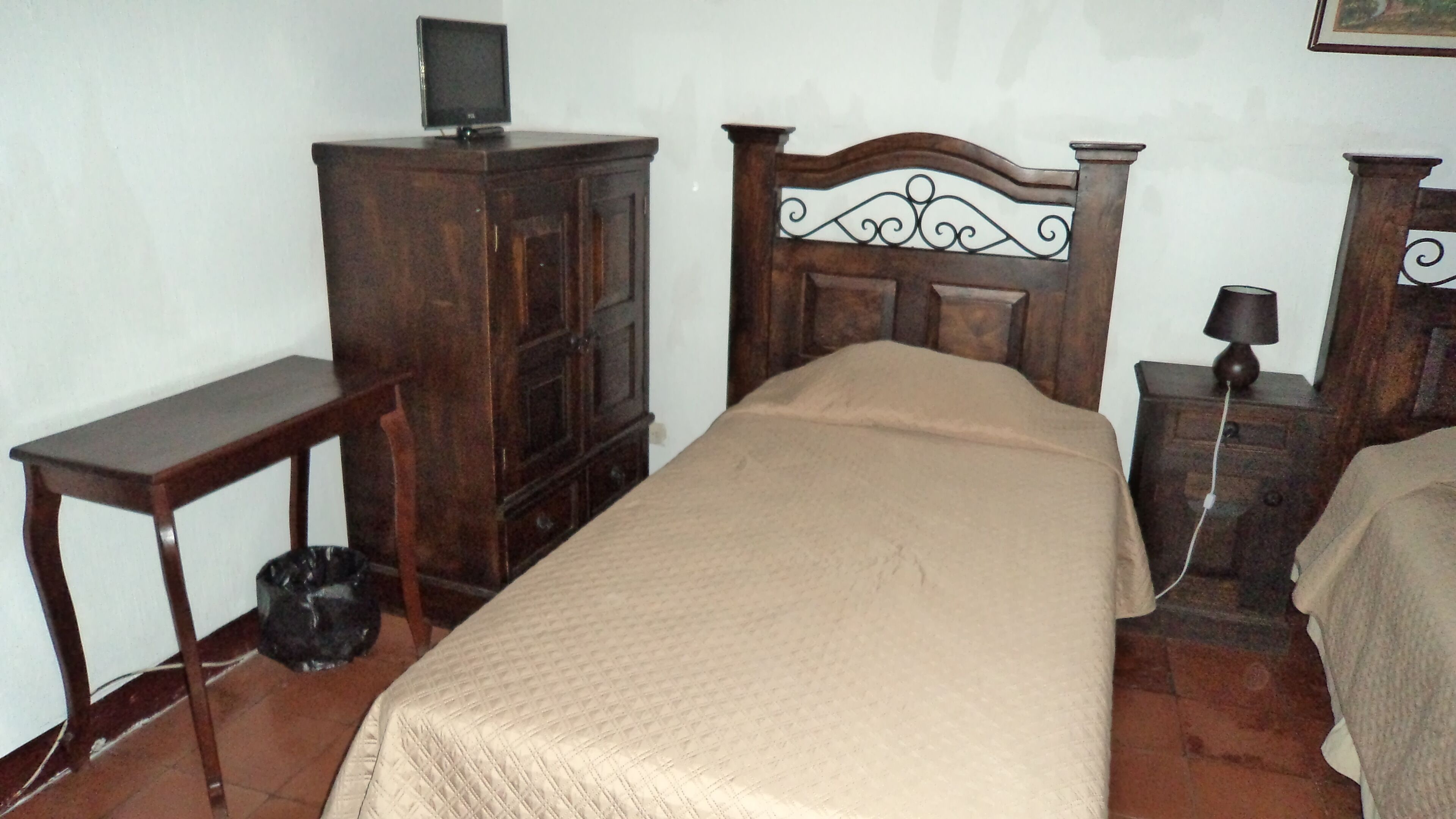 economy room, private external bathroom | down duvets, individually decorated, individually furnished, desk