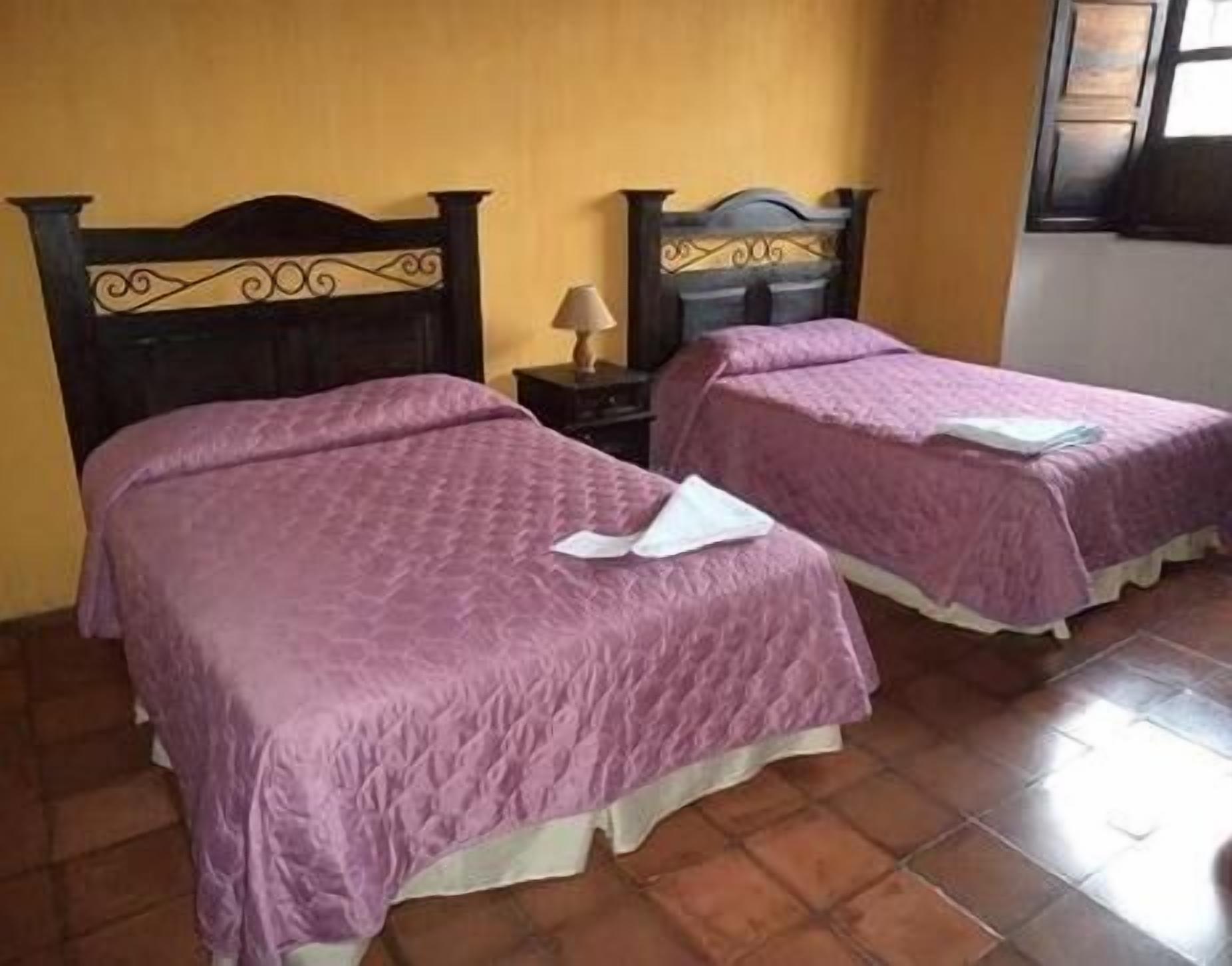 family quadruple room, private bathroom, ground floor | down duvets, individually decorated, individually furnished, desk