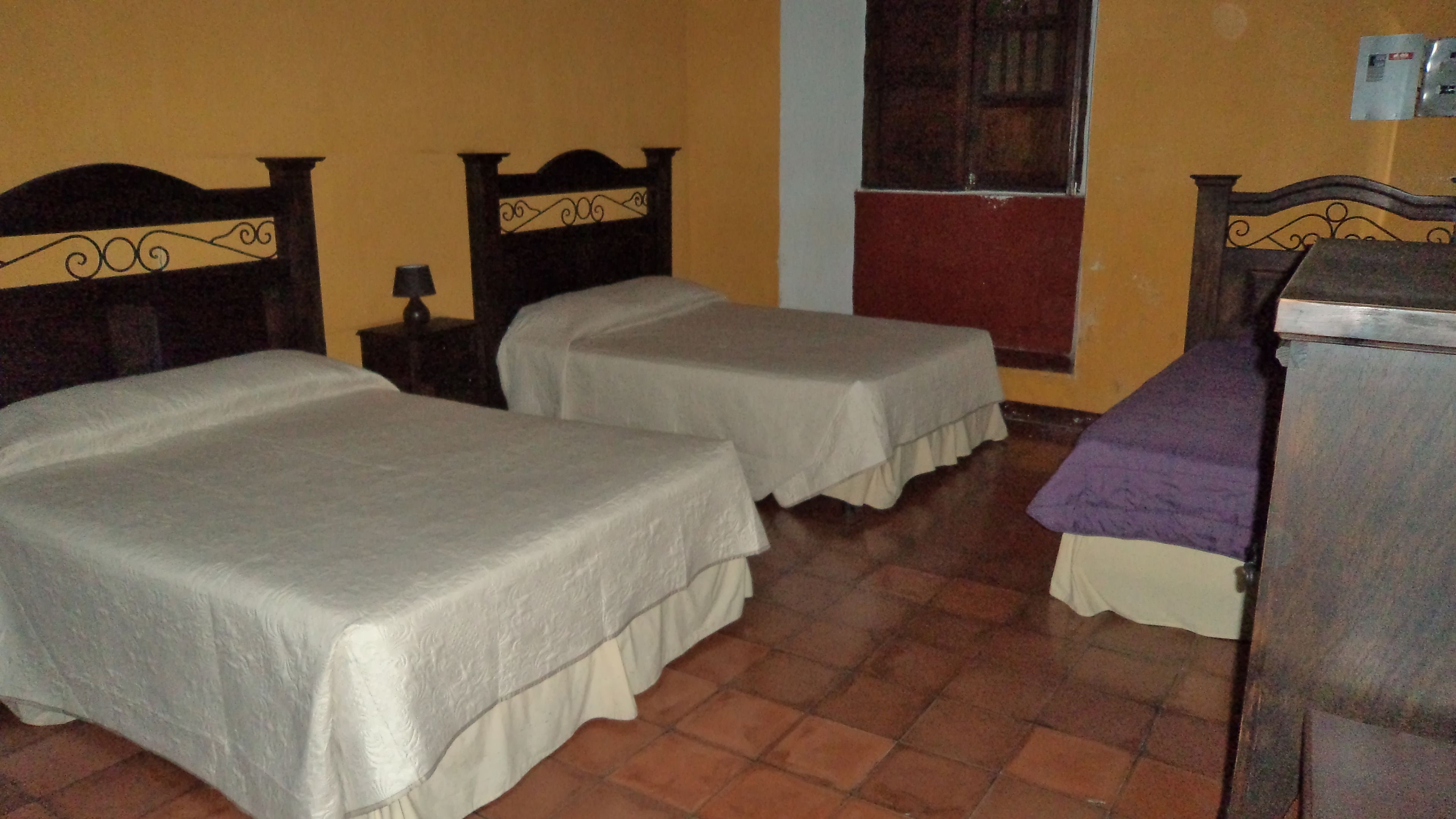 triple room, fireplace | down duvets, individually decorated, individually furnished, desk