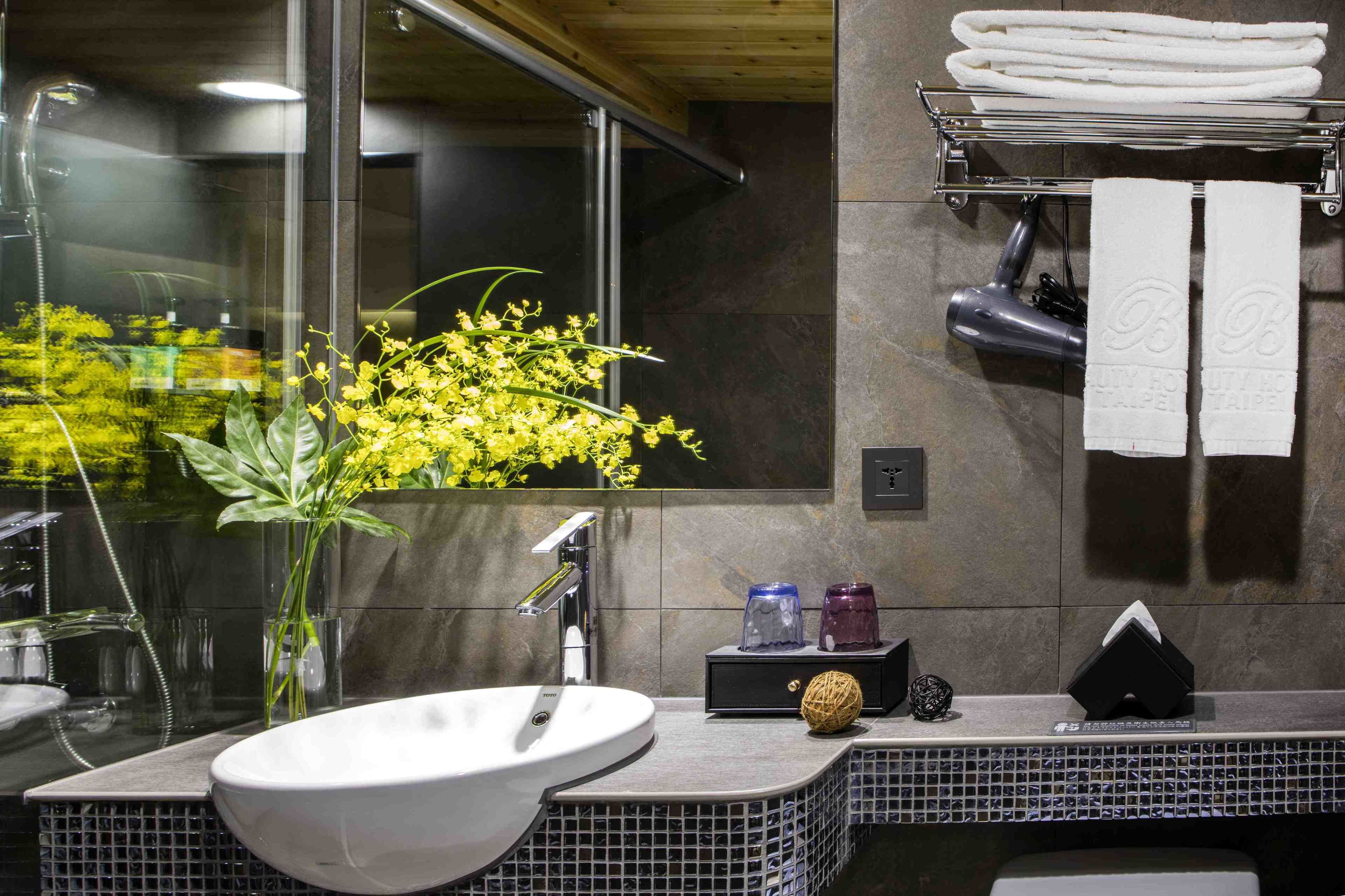 rainfall showerhead, hair dryer, slippers, electronic bidet