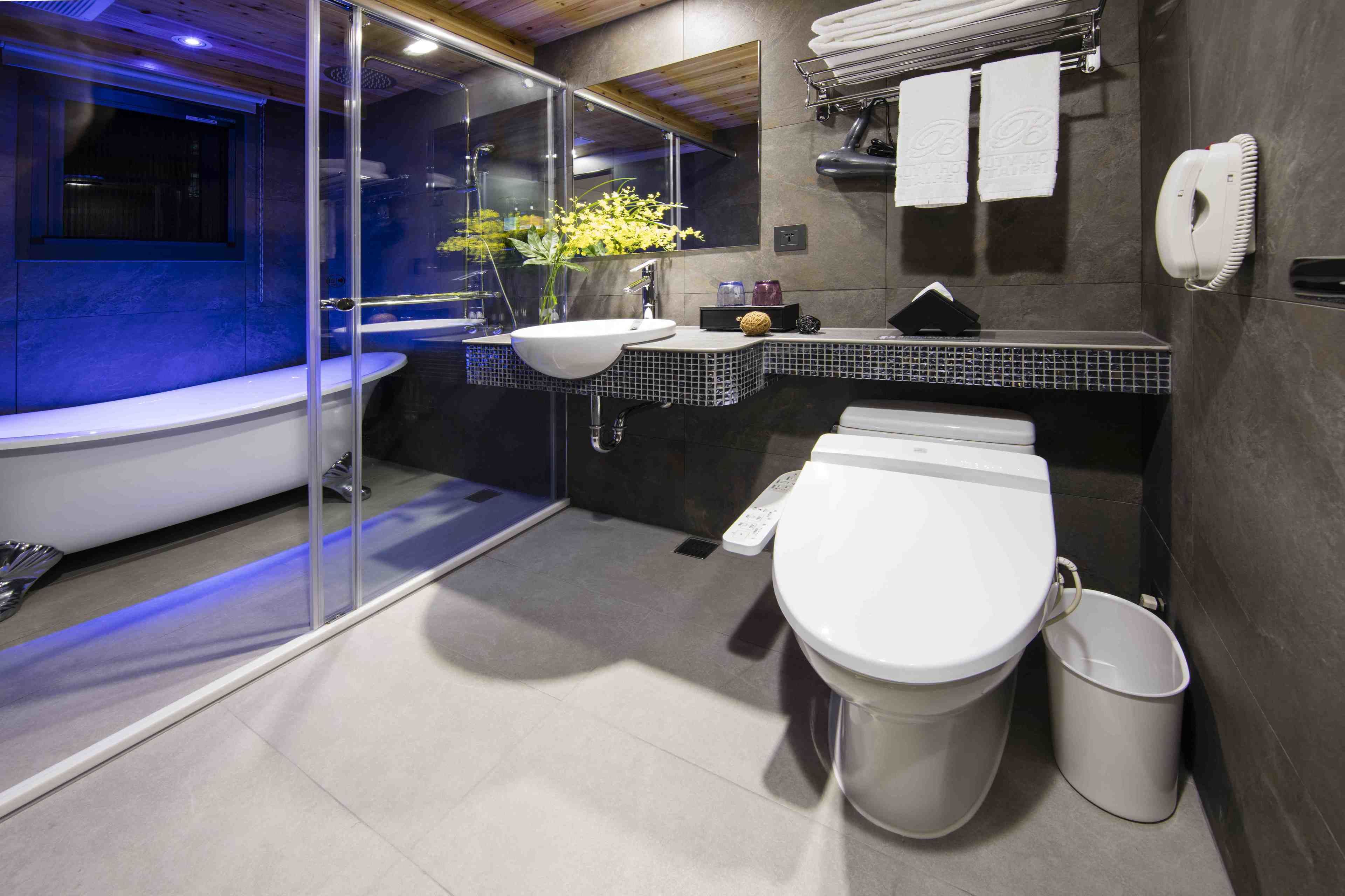 superior double room | bathroom | rainfall showerhead, hair dryer, slippers, electronic bidet