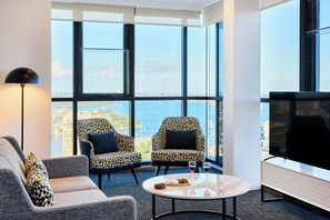 2 Bedroom Corner Harbour View Suite | Living area | 55-inch flat-screen TV with digital channels, TV - Meriton Suites North Sydney (North Sydney)