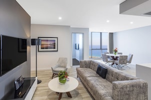 3 Bedroom Ocean Suite | Living area | Flat-screen TV
