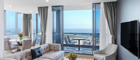 3 Bedroom Balcony Ocean Suite | Living area | Flat-screen TV