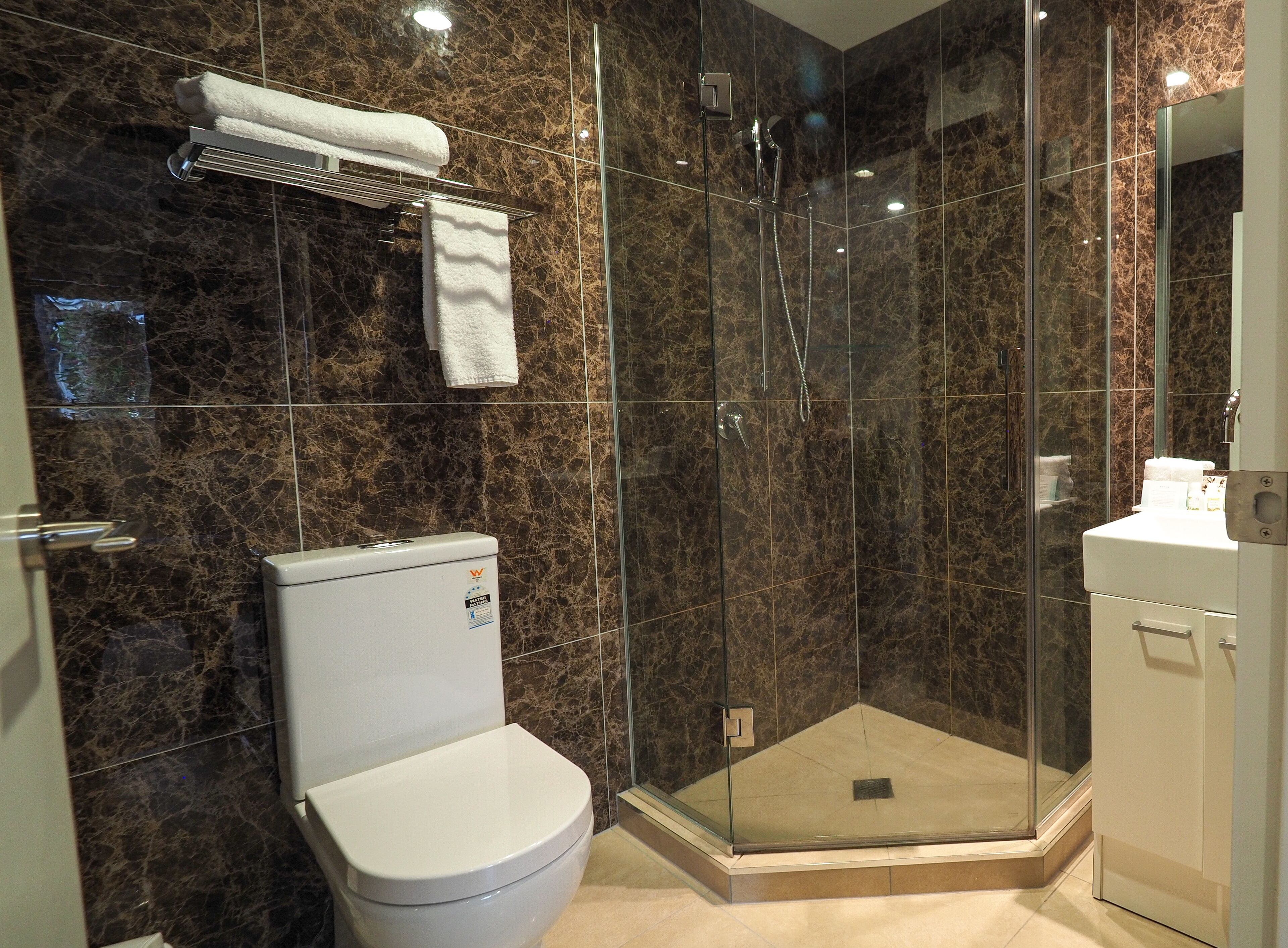 shower, free toiletries, hair dryer, towels